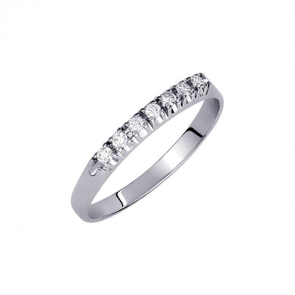 Δαχτυλίδι σειρέ με 7 διαμάντια - μπριγιάν βάρους 0.10ct, ποιότητας G/VS, σε λευκόχρυσο 18 καρατίων.