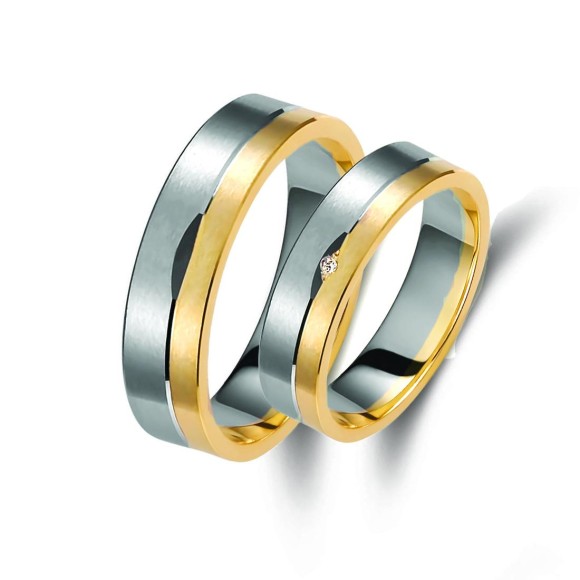 Ζευγάρι βέρες δίχρωμες χρυσό και λευκόχρυσο 14 καρατίων, η γυναικεία με διαμάντι.Σχέδιο 242a-aa 