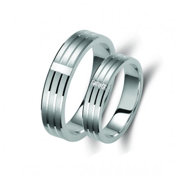 Ζευγάρι βέρες λευκόχρυσες 18 καρατίων, η γυναικεία με πέτρα ζιργκόν. Σχέδιο 314b-ba 