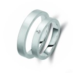 Ζευγάρι βέρες λευκόχρυσες 14 καρατίων, η γυναικεία με πέτρα ζιργκόν. Σχέδιο 185b-ba 