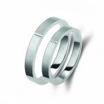 Ζευγάρι βέρες λευκόχρυσες 18 καρατίων, η γυναικεία με πέτρα ζιργκόν. Σχέδιο 338b-ba