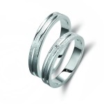 Ζευγάρι βέρες λευκόχρυσες 14 καρατίων, η γυναικεία με πέτρα ζιργκόν. Σχέδιο 346b-ba 