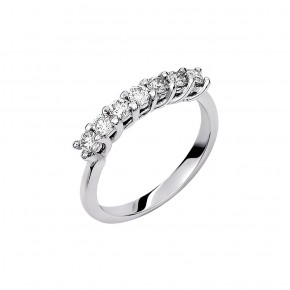 Δαχτυλίδι σειρέ με 7 διαμάντια - μπριγιάν βάρους 0.55ct, ποιότητας G/VS, σε λευκόχρυσο 18 καρατίων.