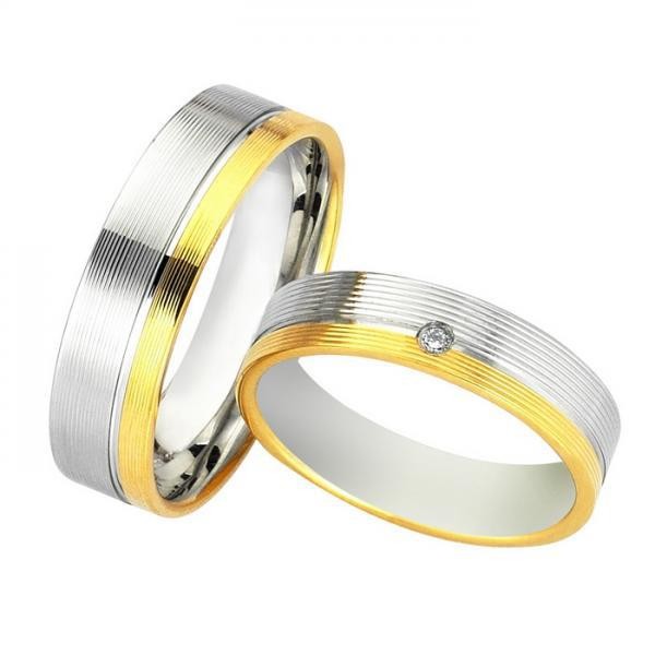 Ζευγάρι βέρες Bonise, δίχρωμες από χρυσό και λευκόχρυσο 14 καρατίων,η γυναικεία με πέτρα ζιργκόν. Σχέδιο wd400560ae 