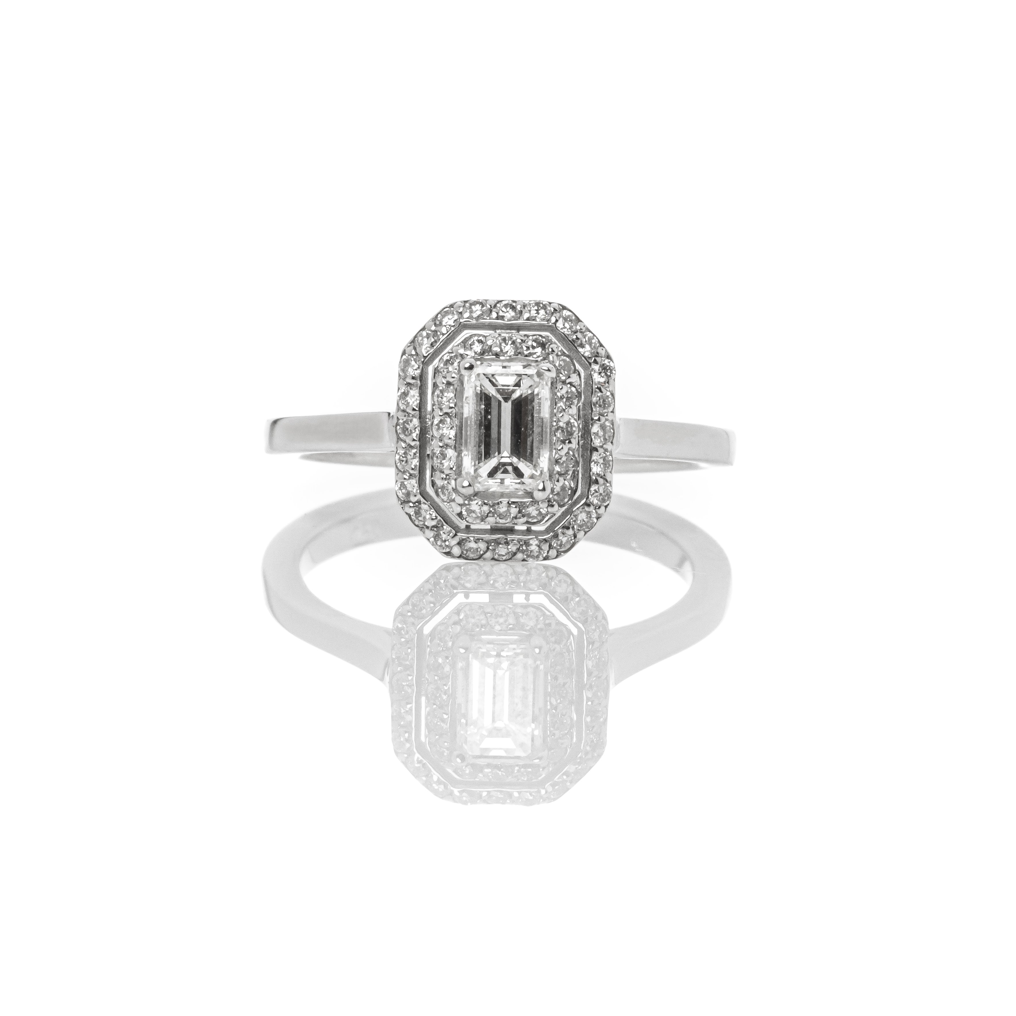 Δαχτυλίδι emerald cut center ροζέτα 0.70ct